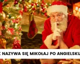 Święty Mikołaj z palcem na ustach, obok choinki. Jak nazywa się Mikołaj po angielsku?